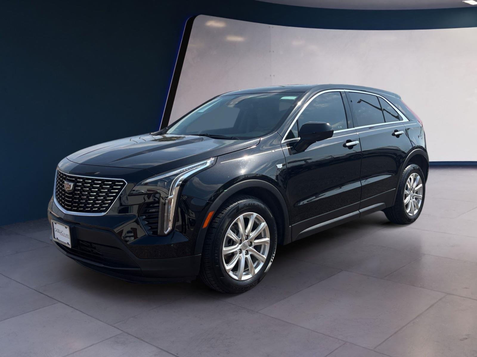 Used 2023 Stellar Black Metallic Cadillac FWD Luxury image 1