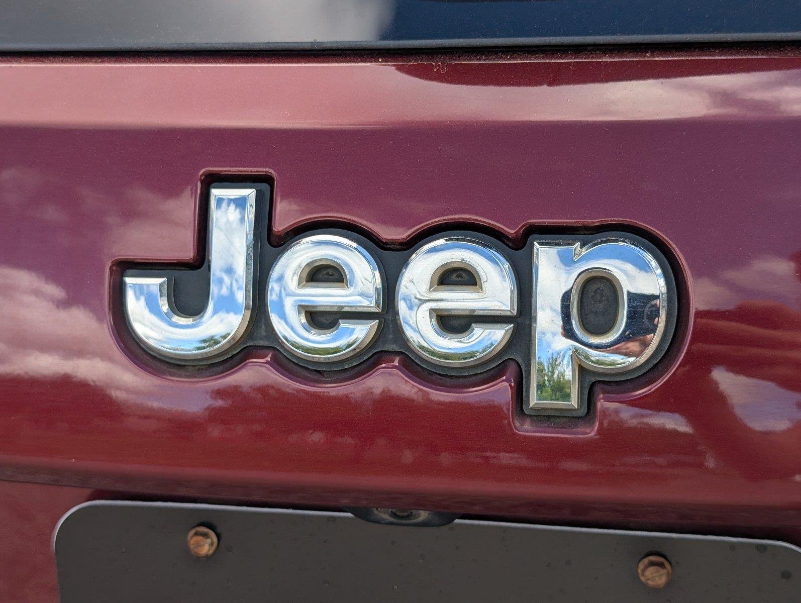 Used 2021 Velvet Red Pearlcoat Jeep Limited image 6