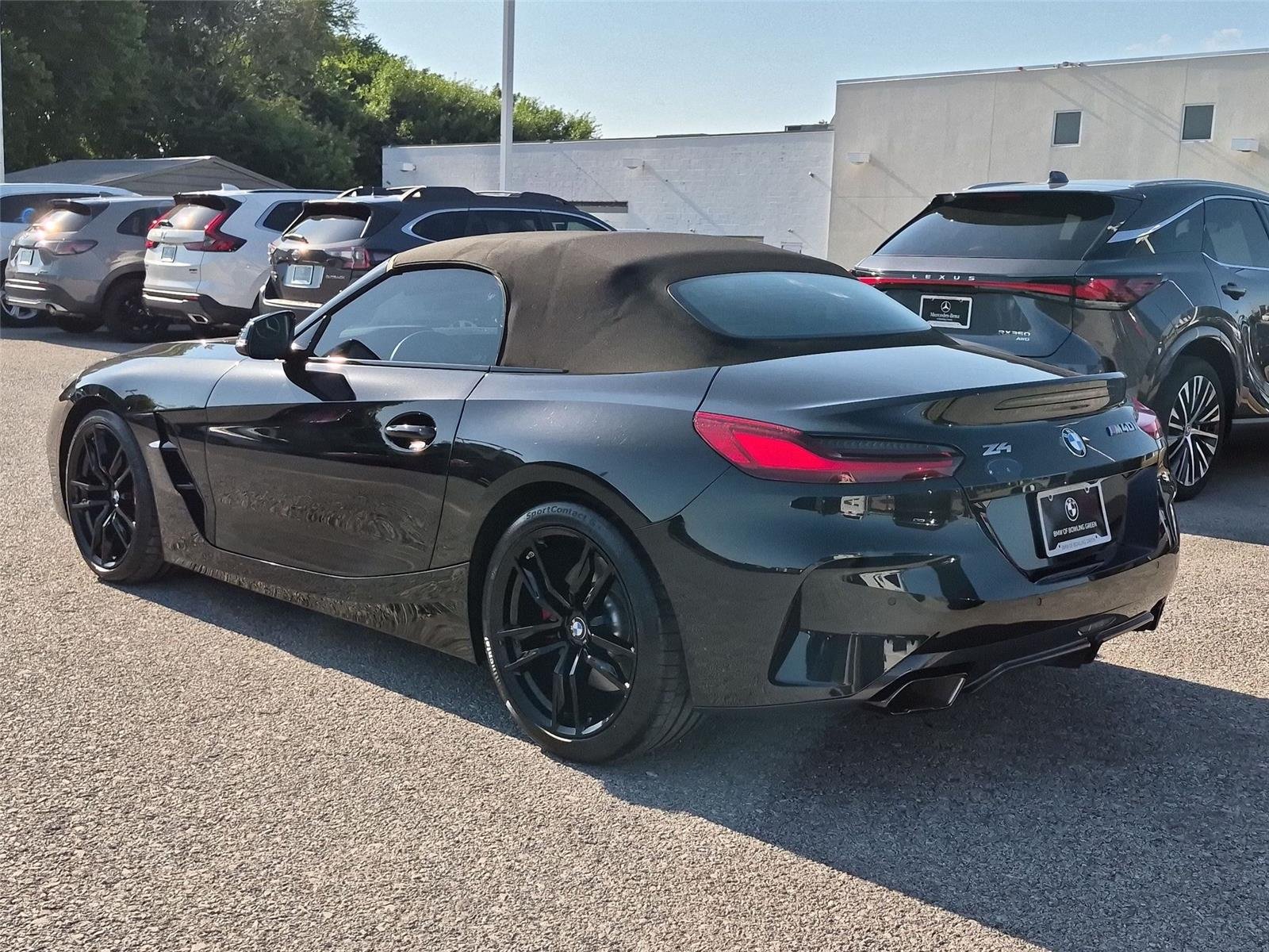 Used 2025 Black Sapphire Metallic BMW M40i image 3