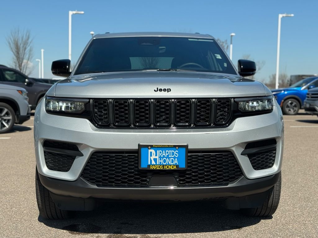 Used 2025 Jeep Grand Cherokee Altitude with VIN 1C4RJHAGXS8699320 for sale in Coon Rapids, Minnesota