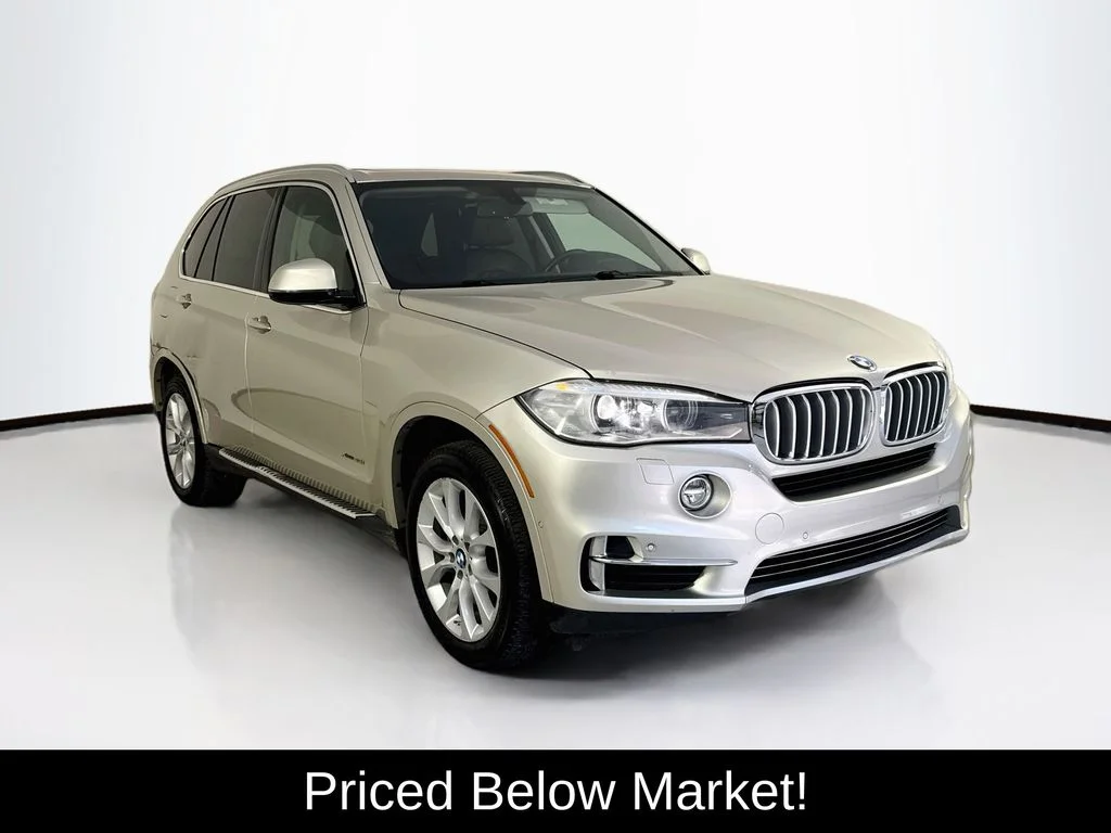 Used 2014 Mineral Silver Metallic BMW xDrive35i image 1