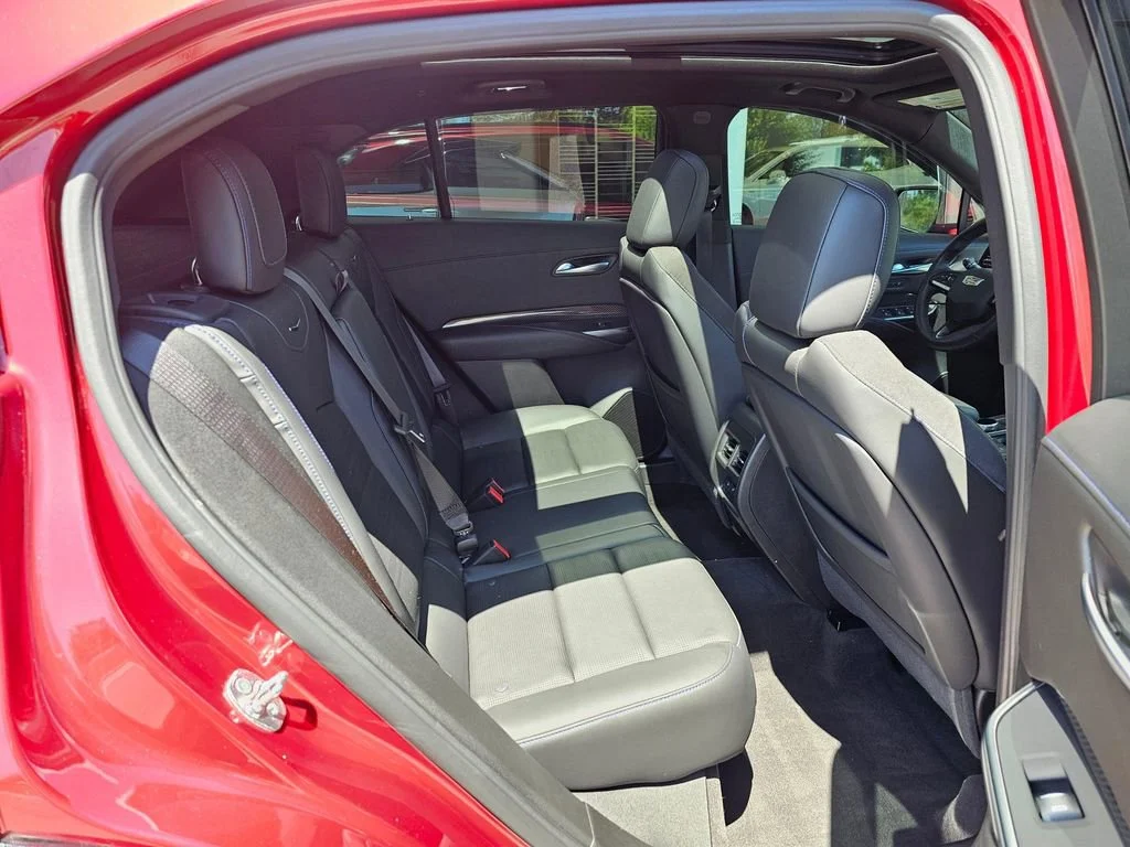 Used 2024 Radiant Red Tintcoat Cadillac Sport image 12