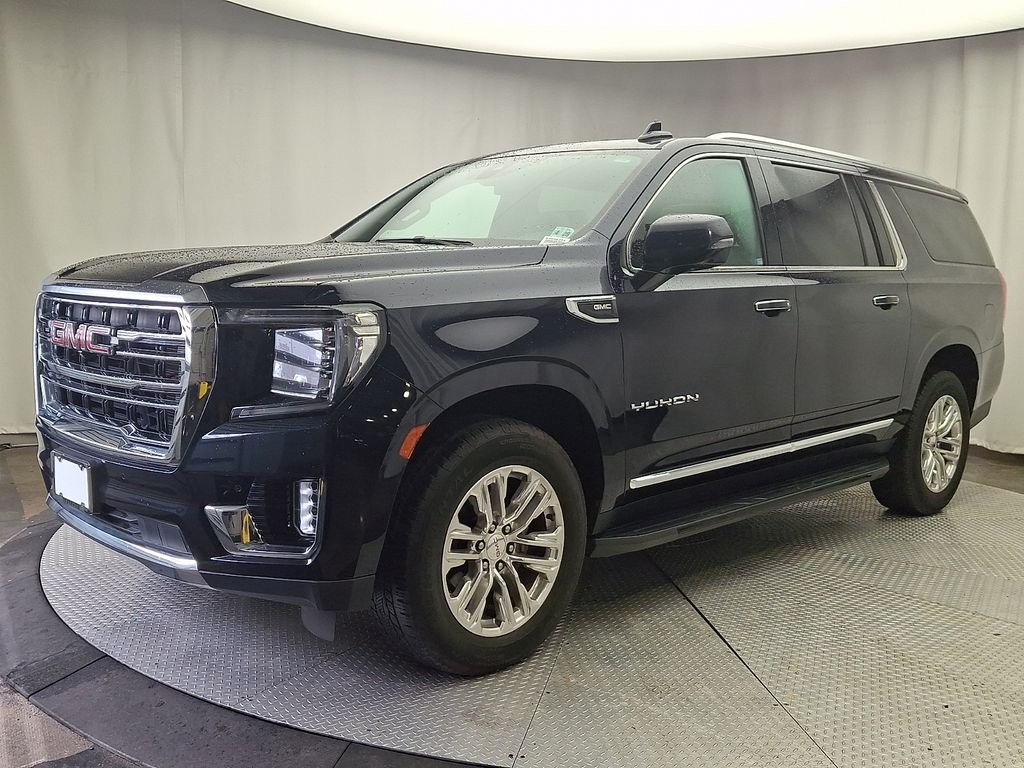 Used 2021 Midnight Blue Metallic GMC SLT image 1