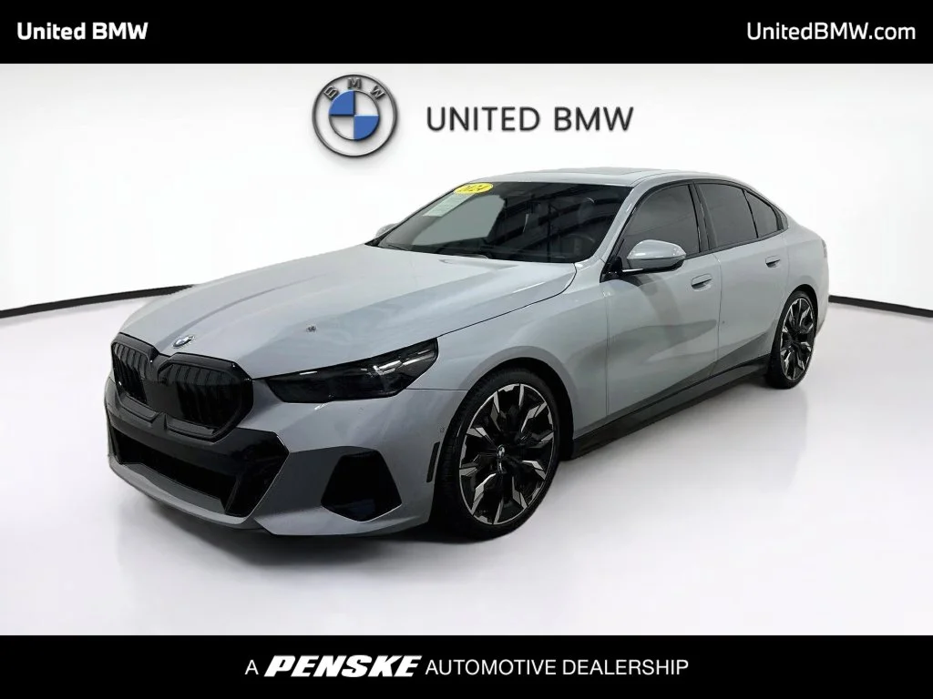 Used 2024 Brooklyn Grey Metallic BMW 540i xDrive image 1