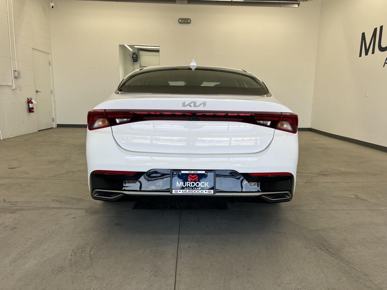 Used 2023 Glacial White Pearl Kia LXS image 3