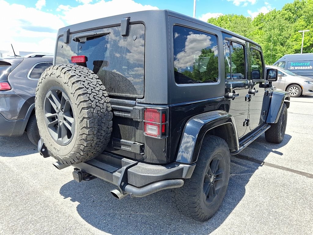 Used 2017 Black Jeep Unlimited Sahara image 6