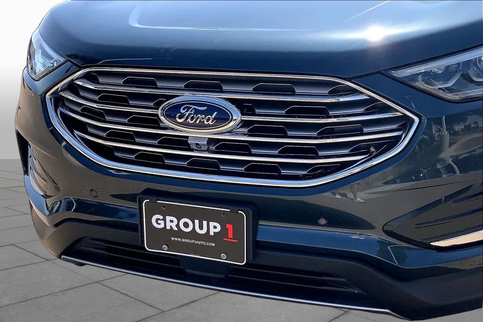 Certified Used 2024 Stone Blue Metallic Ford Titanium image 30
