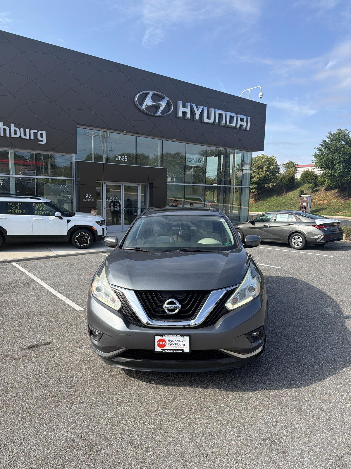 Used 2016 Gun Metallic Nissan SV image 3