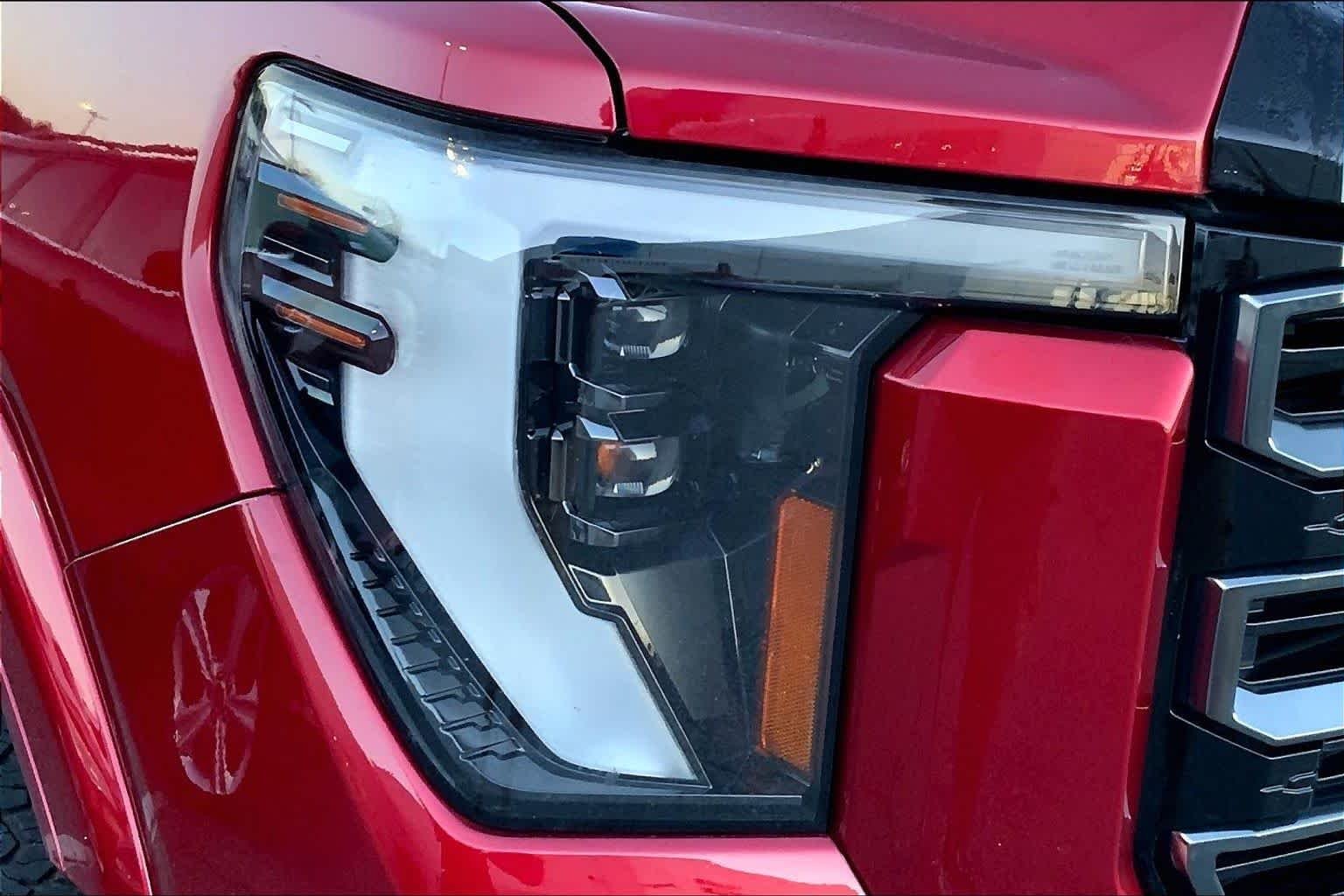 Used 2024 Volcanic Red Tintcoat GMC AT4 image 24