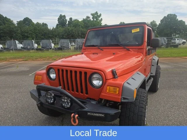 Used 2005 Impact Orange Cle Jeep Sport image 3