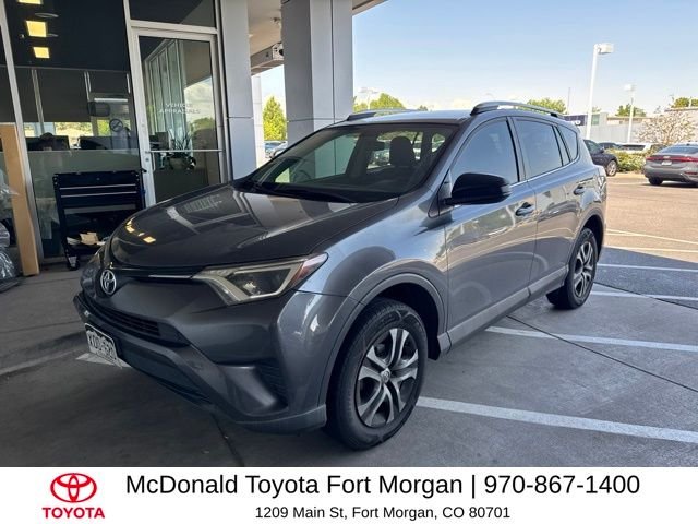 Used 2016 Gray Toyota LE image 1