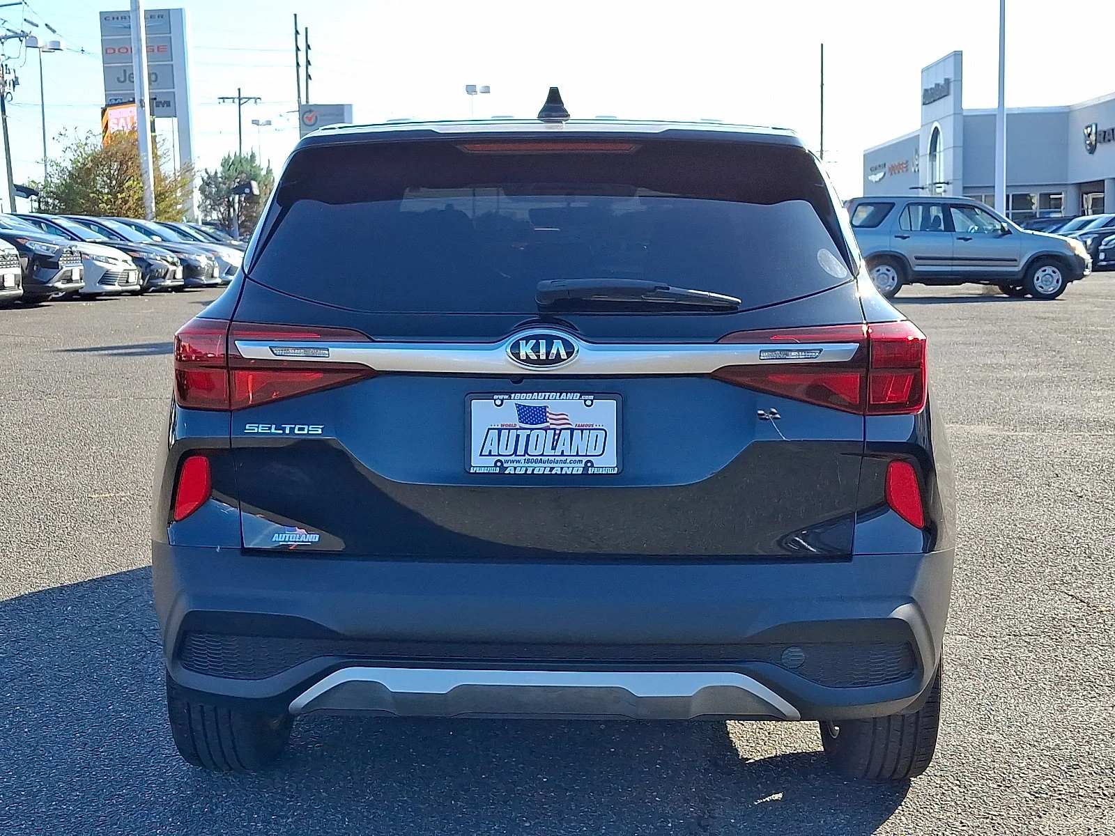 Used 2021 Cherry Black Kia LX image 6