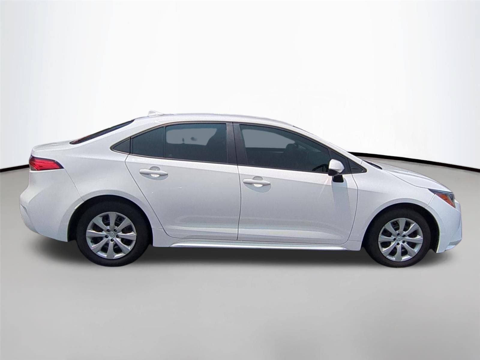 Used 2021 Super White Toyota LE image 4