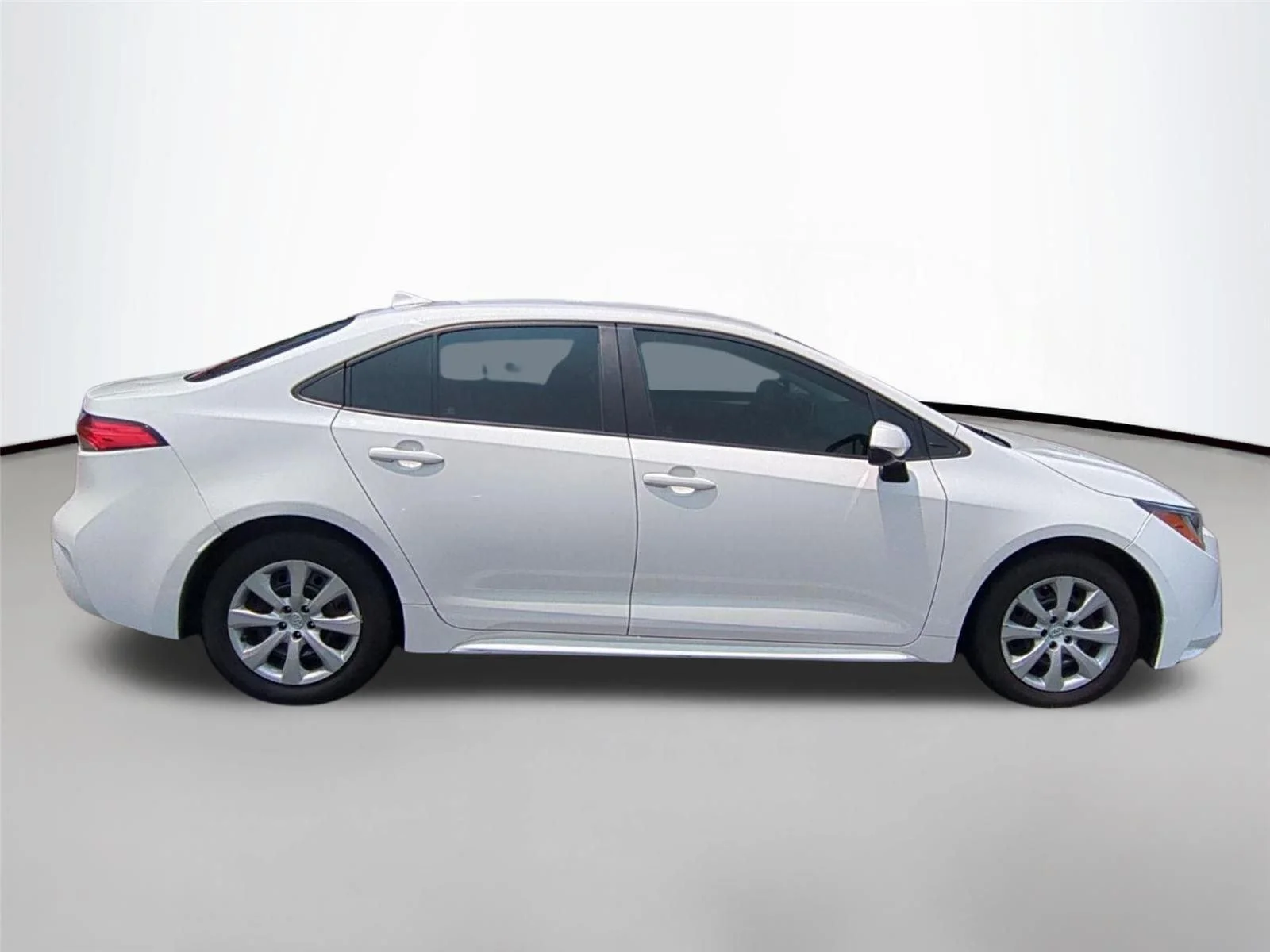 Used 2021 Super White Toyota LE image 4