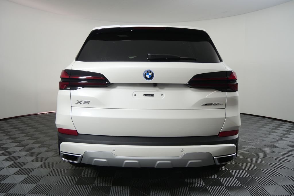 Used 2026 Mineral White Metallic BMW xDrive50e image 4