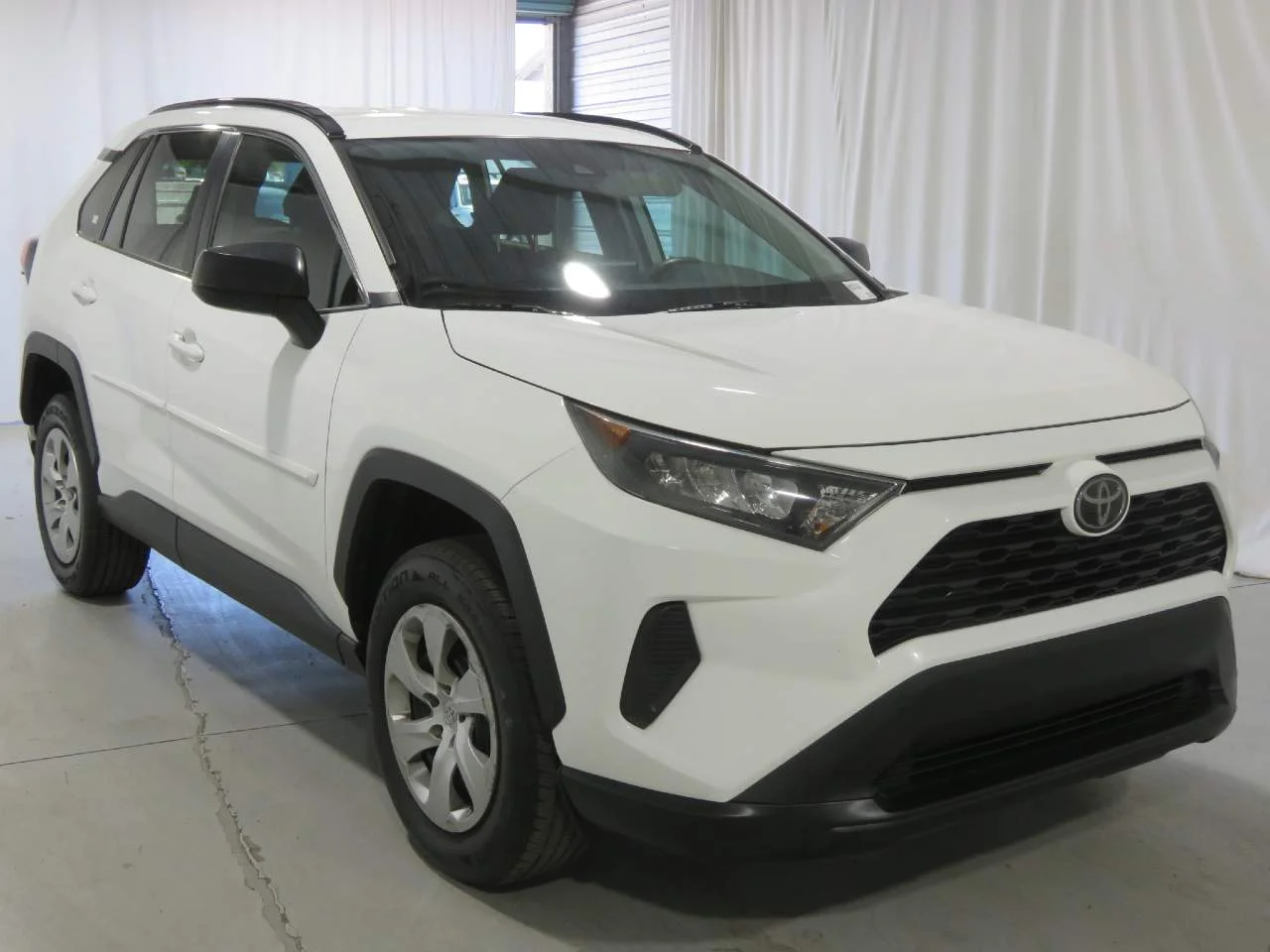 Used 2019 Super White Toyota LE image 3