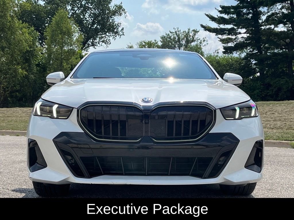 Used 2026 Mineral White Metallic BMW 550e xDrive image 2