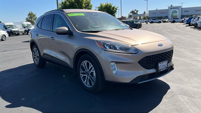 Used 2021 GOLD Ford SEL image 1