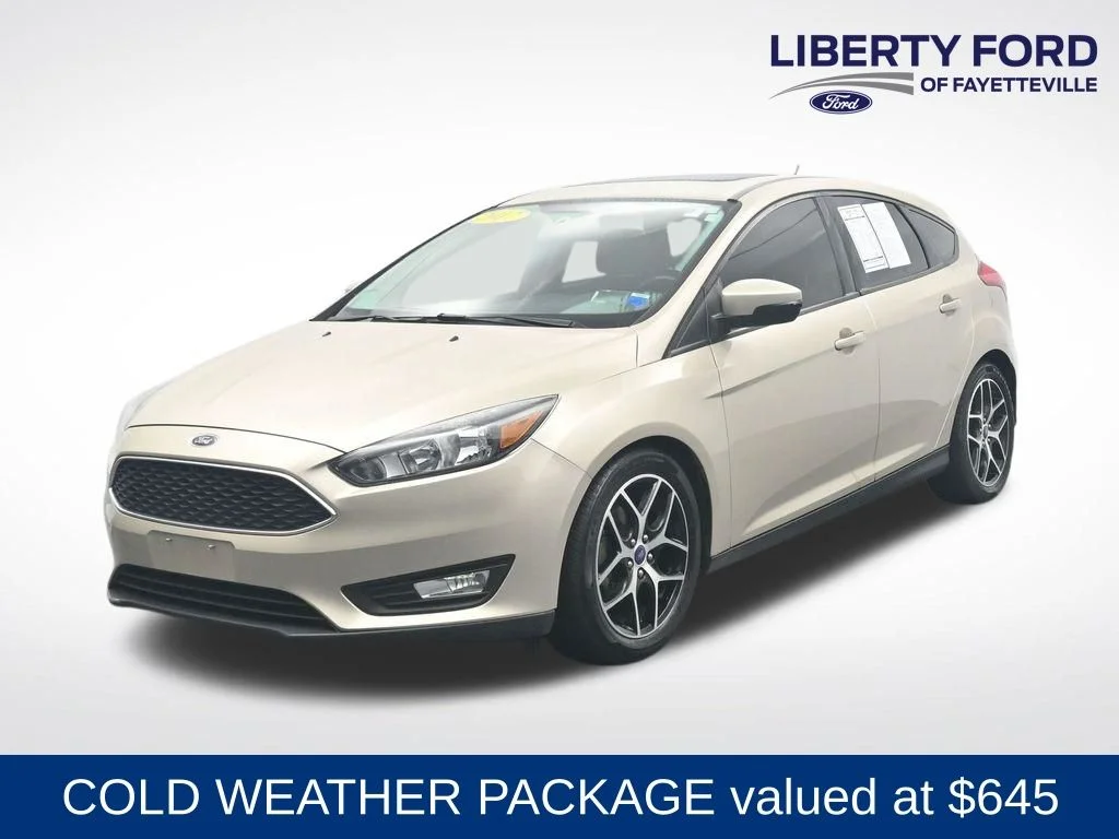 Used 2017 White Gold Metallic Ford SEL image 1