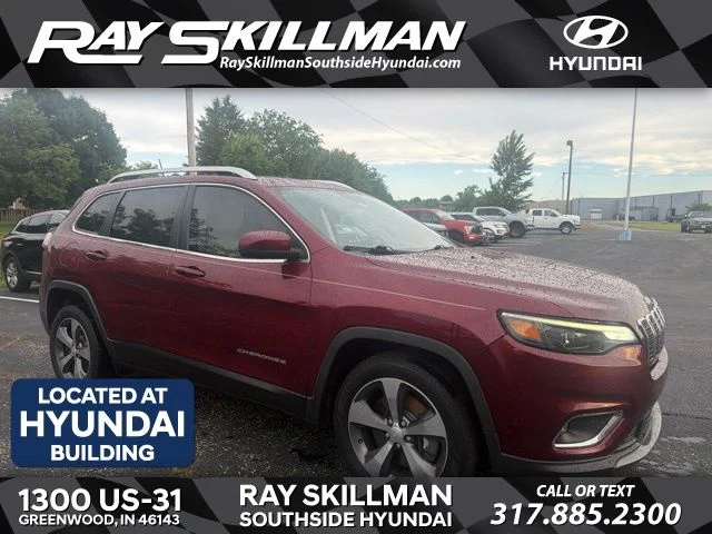 Used 2019 Velvet Red Pearlcoat Jeep Limited image 1
