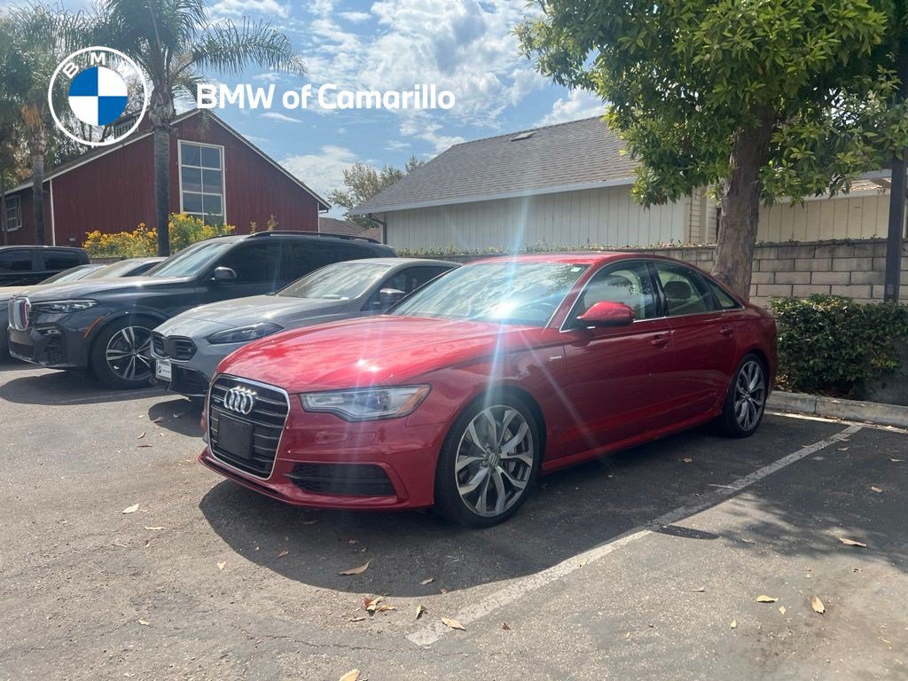 Used 2013 Garnet Red Pearl Audi 3.0T Prestige image 1