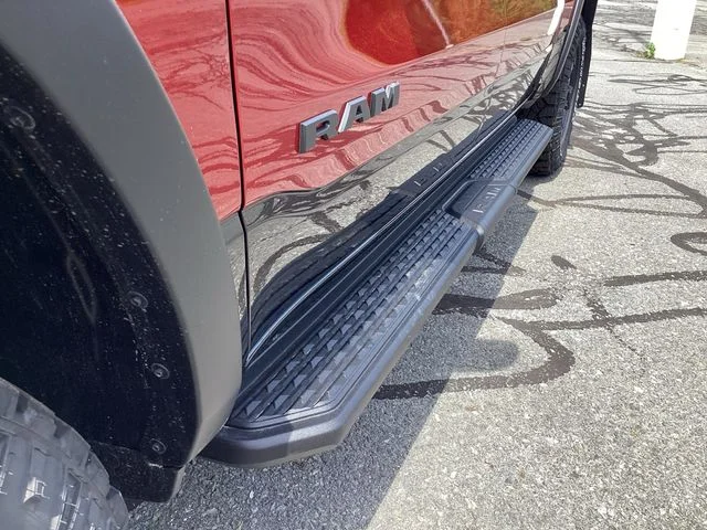 New 2026 Molten Red Ram REBEL CREW CAB 4X4 5