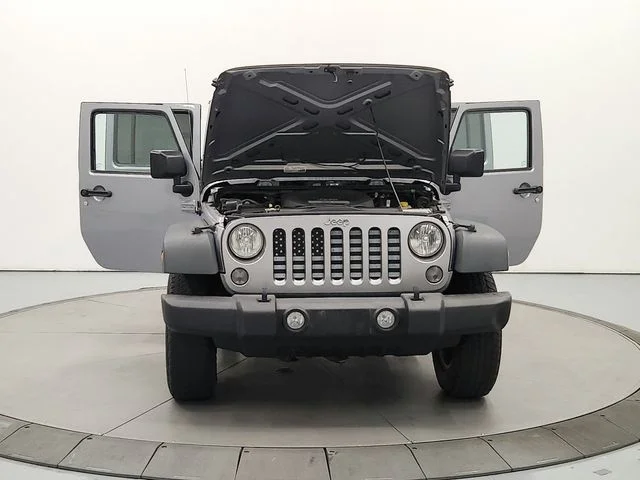 Used 2015 Silver Jeep Unlimited Sport image 11