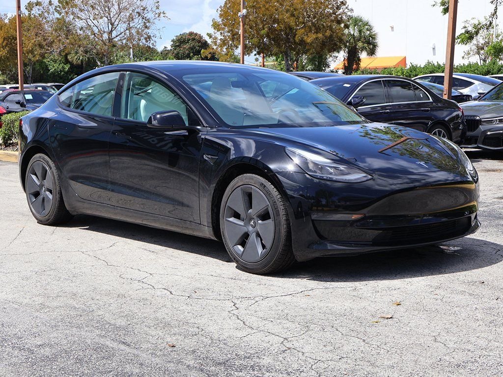 Used 2021 Tesla Model 3 Base with VIN 5YJ3E1EA2MF991974 for sale in Miami, FL