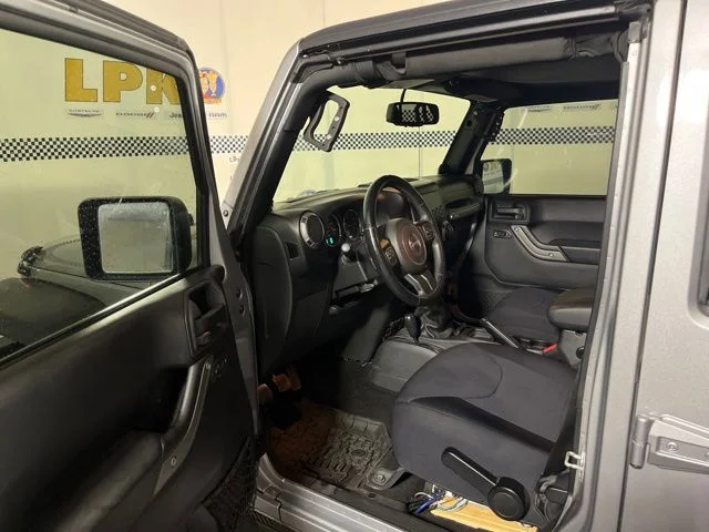 Used 2014 Billet Metallic Clearcoat Jeep Unlimited Sport image 9