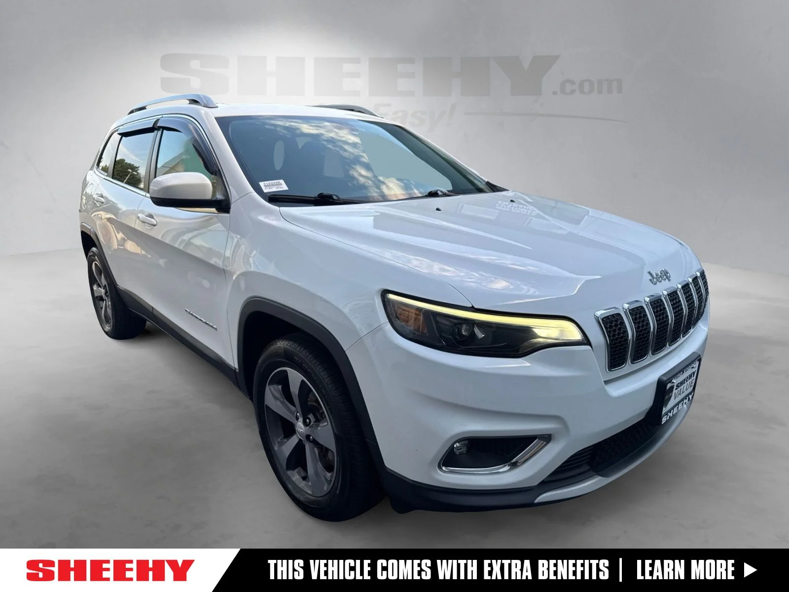 Used 2019 Bright White Clearcoat Jeep Limited image 1