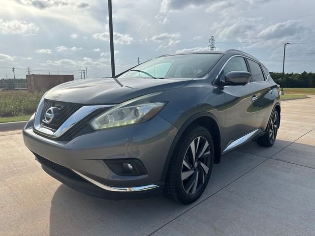 Used 2016 Gray Nissan Platinum image 1