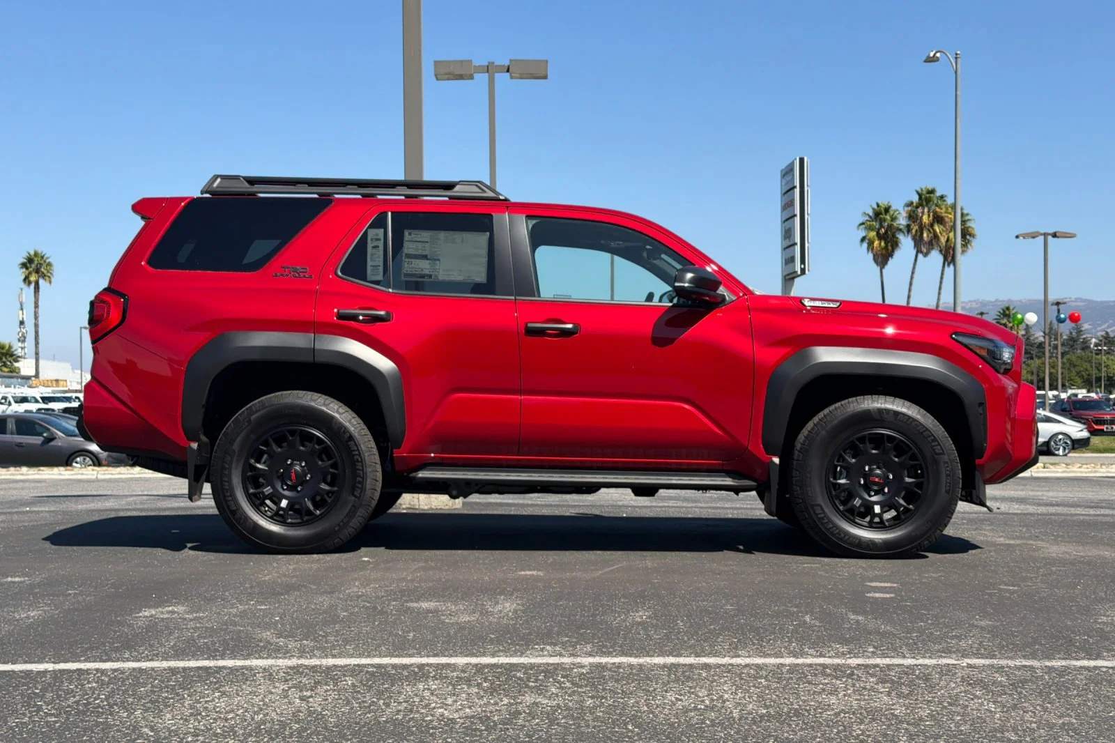 New 2026 Supersonic Red Toyota TRD Off-Road Premium i-FORCE MAX image 3