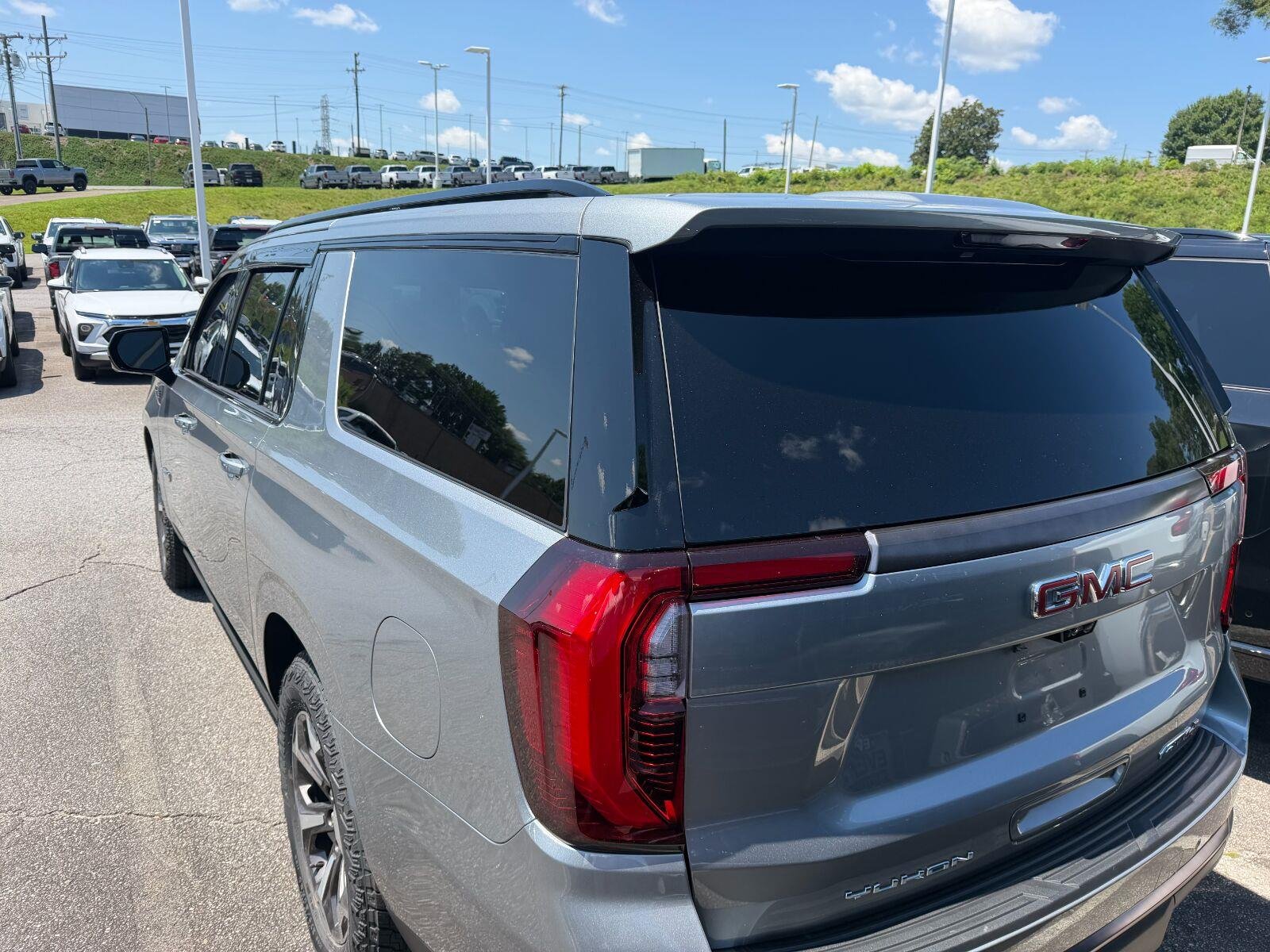 Used 2025 Sterling Metallic GMC AT4 Ultimate image 3