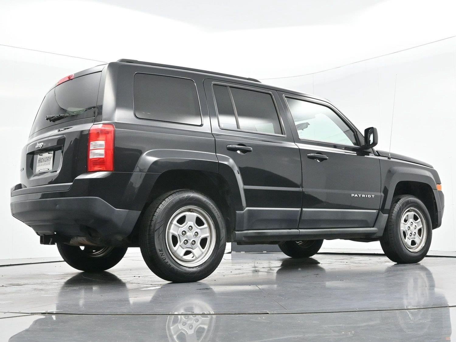 Used 2011 Brilliant Black Crystal Pearl Jeep Sport image 41