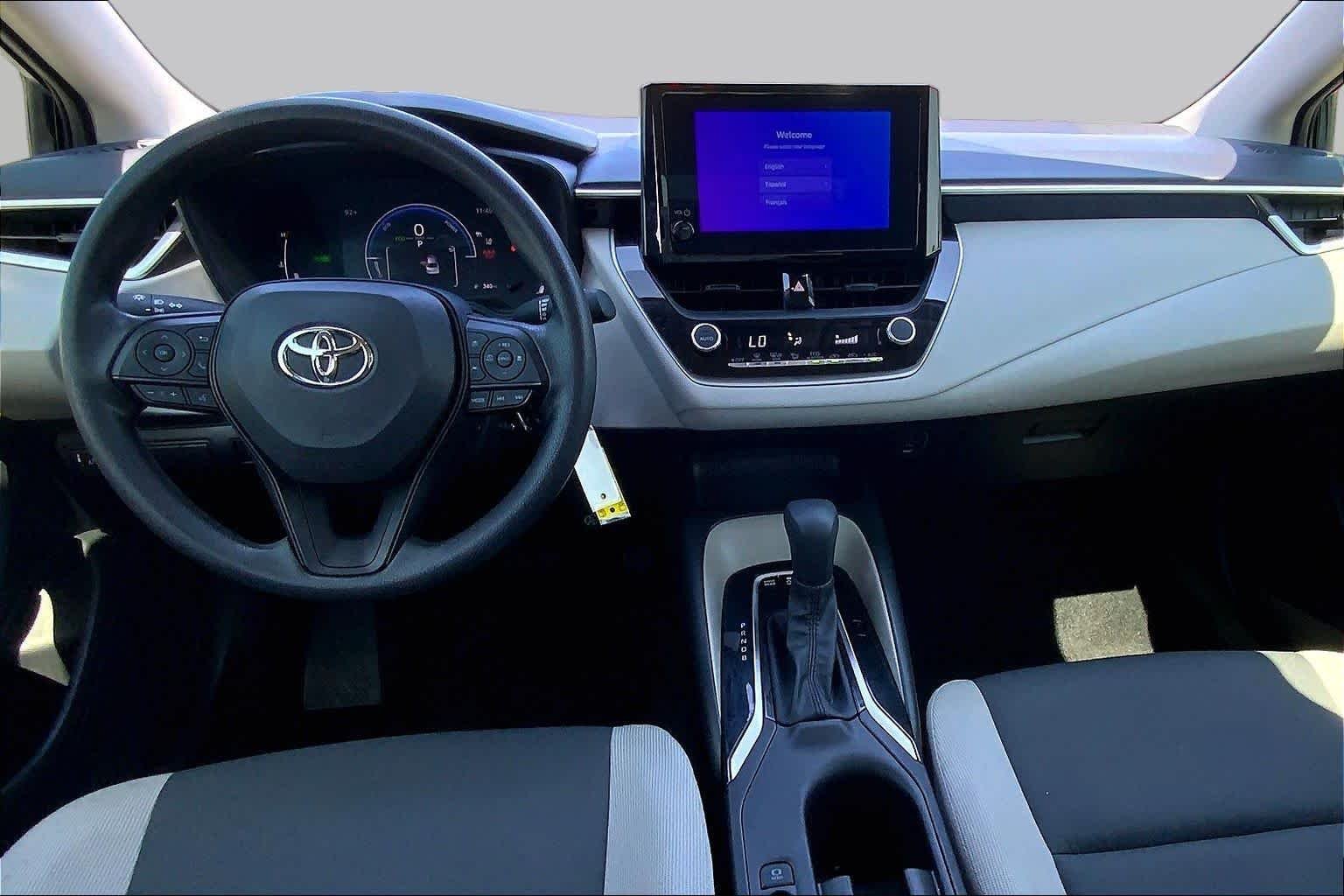 Used 2026 Midnight Black Metallic Toyota Hybrid LE image 16