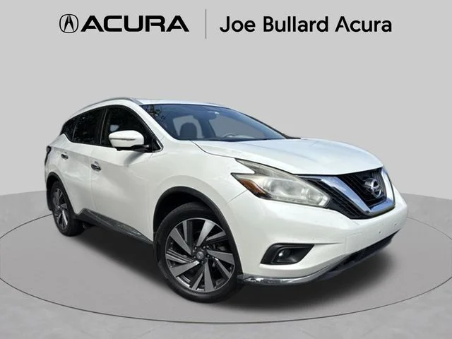Used 2015 White Nissan Platinum image 1