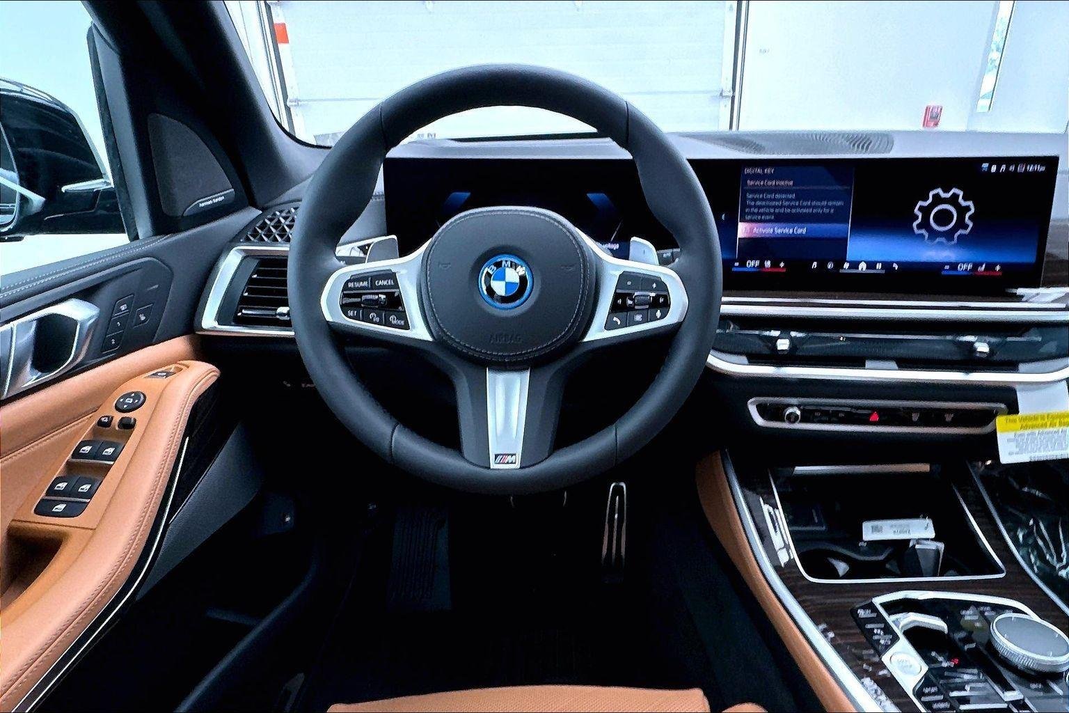 New 2026 Carbon Black Metallic BMW xDrive50e image 11