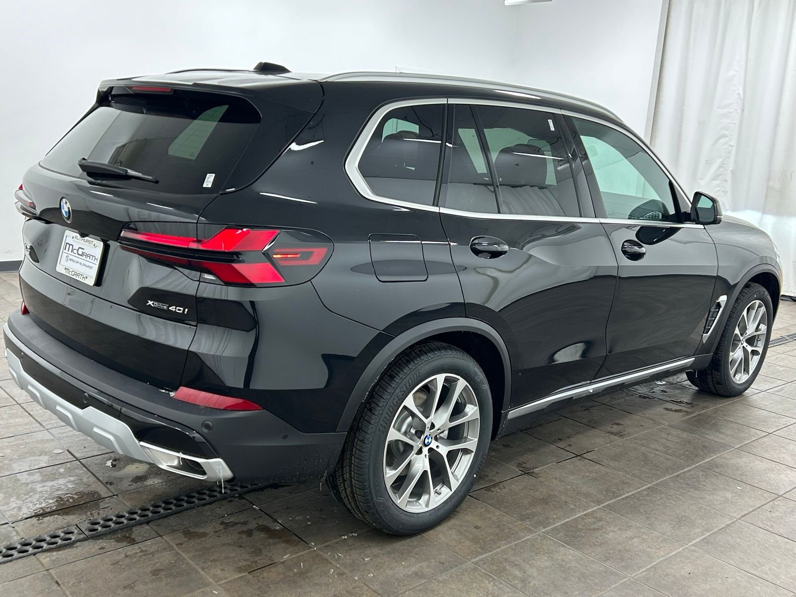 New 2026 Black Sapphire Metallic BMW xDrive40i image 7