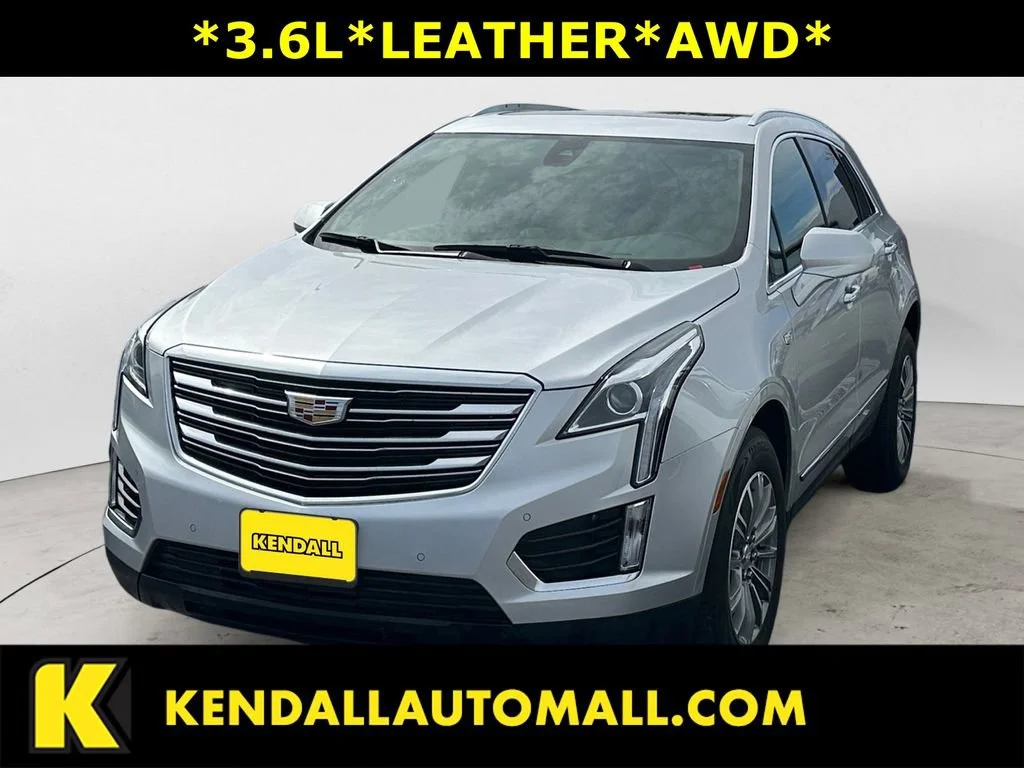 Used 2018 RADIANT SILVER METALLIC Cadillac Luxury AWD image 1