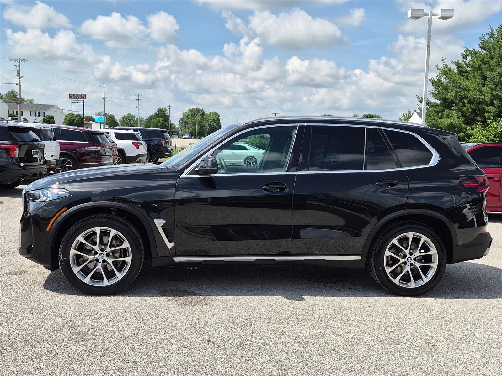 Used 2024 Black Sapphire Metallic BMW xDrive40i image 2
