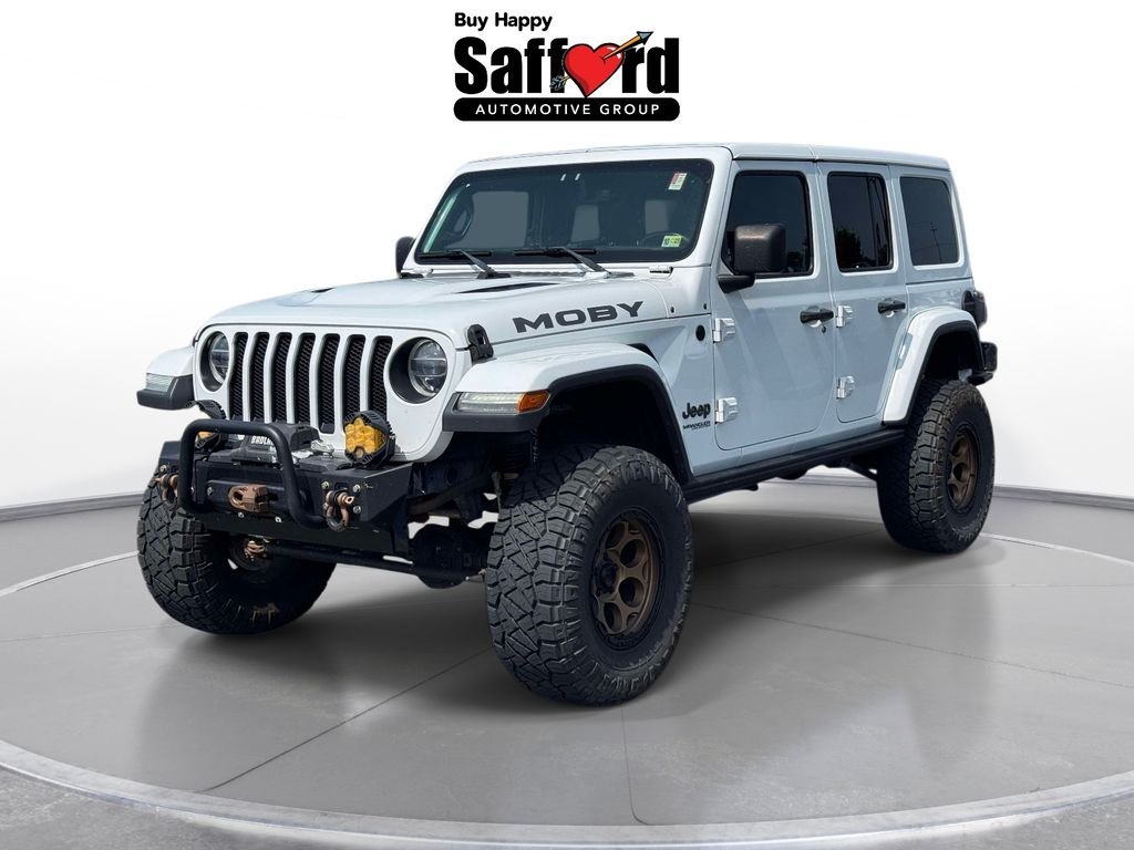 Used 2019 White Jeep Unlimited Sahara image 1