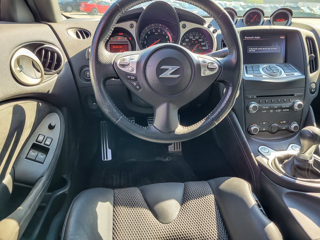 Used 2018 Passion Red Nissan Touring Sport image 11