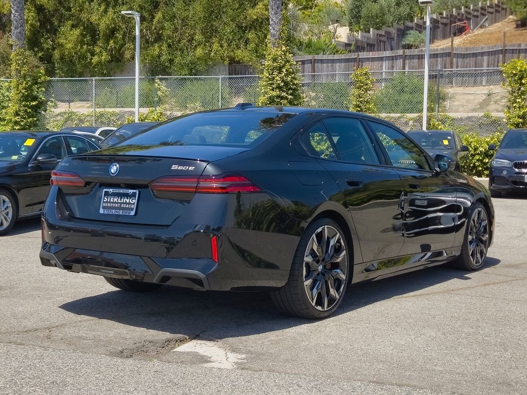 New 2026 Black Sapphire Metallic BMW 550e xDrive image 18