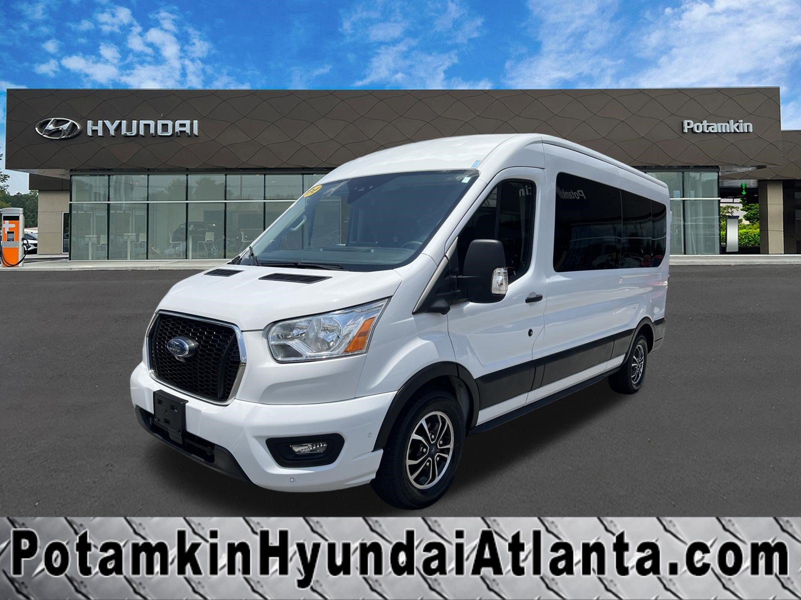 2022 Ford Transit 350 XLT Med Roof Sliding Pass. 148's photo
