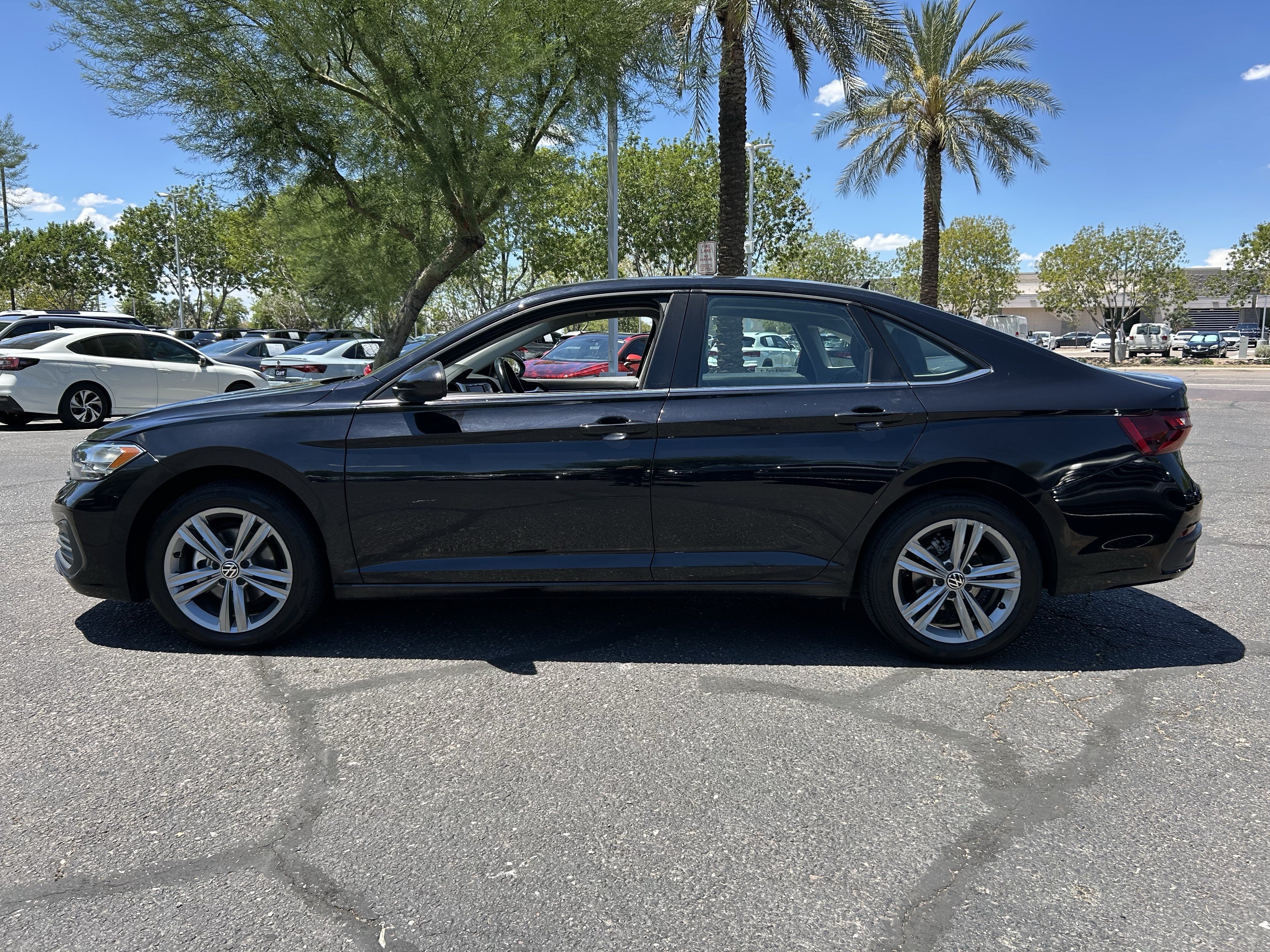 Used 2024 Black Volkswagen SE image 2