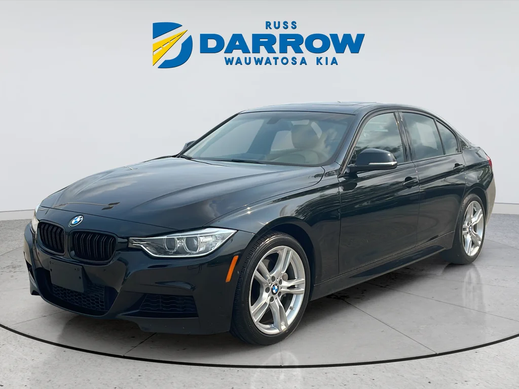 Used 2013 Black BMW 335i xDrive image 1