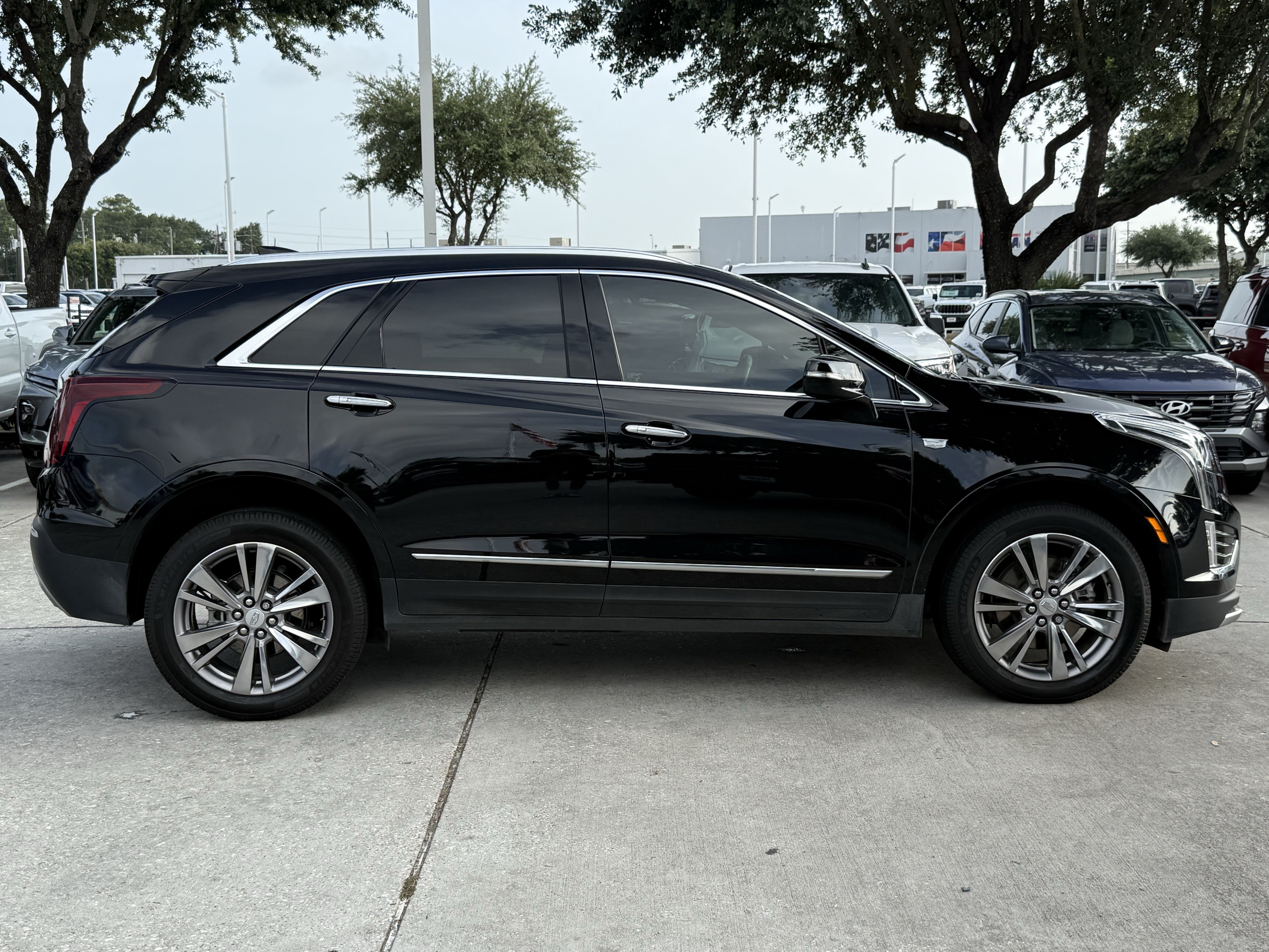 Used 2023 Stellar Black Metallic Cadillac FWD Premium Luxury image 3