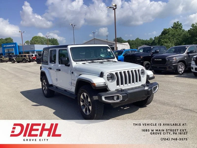 Used 2022 White Jeep Unlimited Sahara image 1