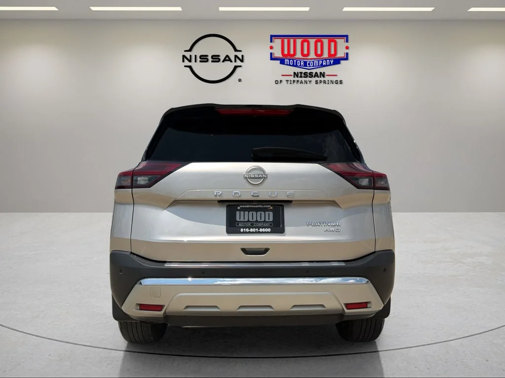 Used 2023 Champagne Silver Metallic Super Black Nissan Platinum image 3