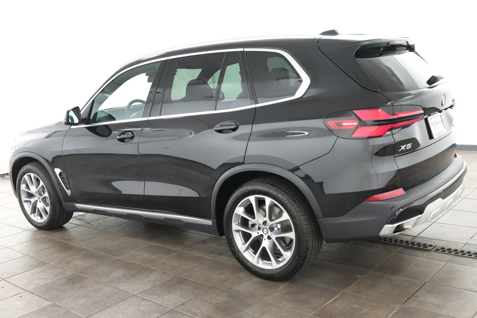 Certified Used 2024 Black Sapphire Metallic BMW xDrive40i image 3